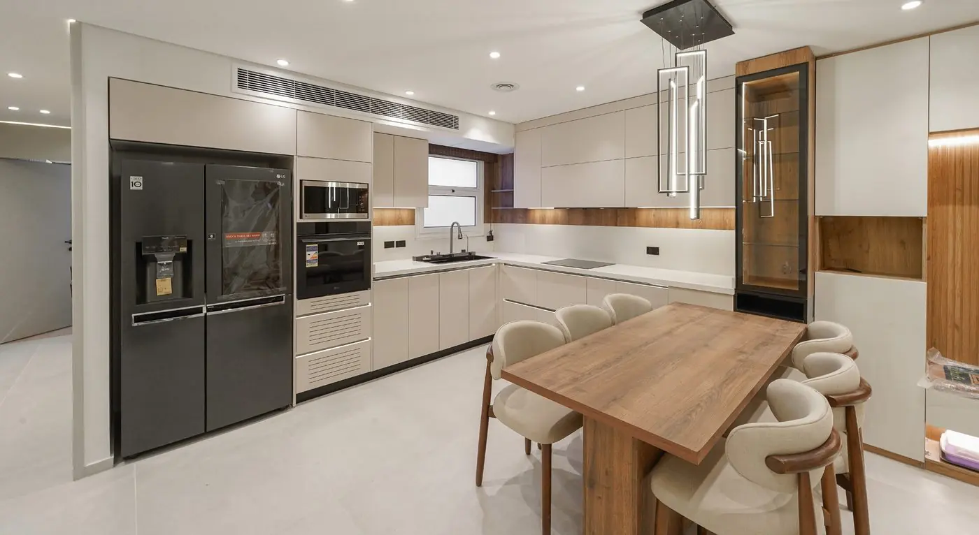 Light Stova kitchen with a wooden dining table
