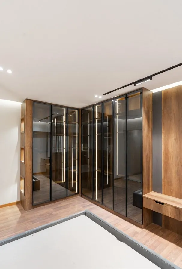Stova dressing room with glass doors and interior lighting