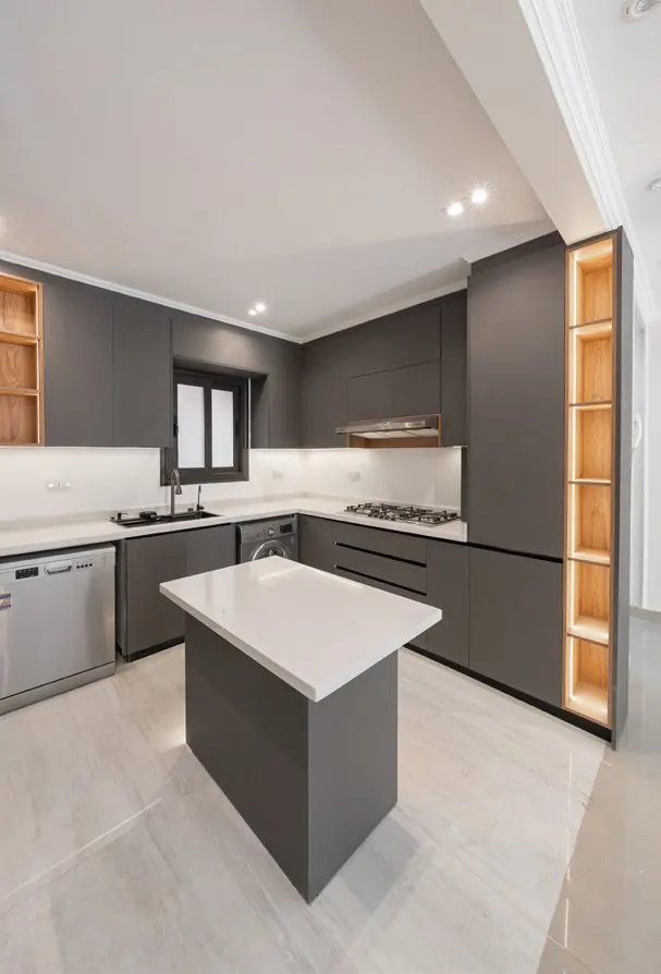 Grey Stova kitchen with a central island